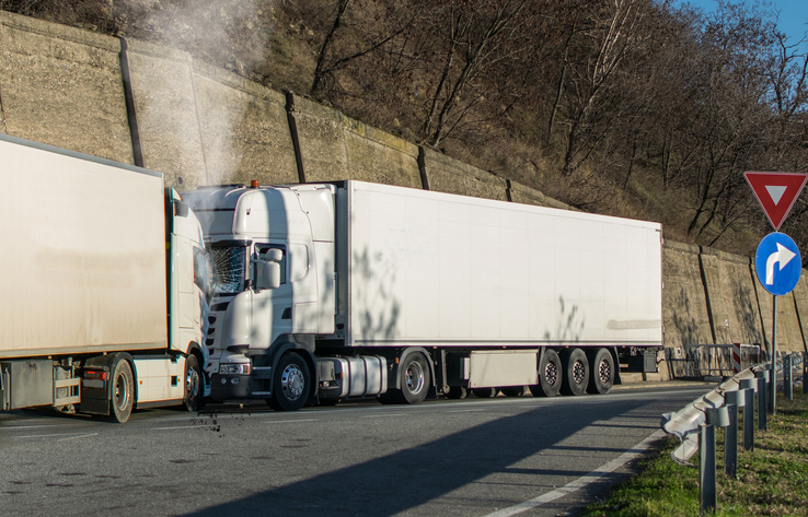 Frontal collision between two semi trucks